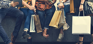 photo of people shopping - links to personal credit cards page