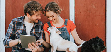photo of couple shopping online - links to personal banking debit card page